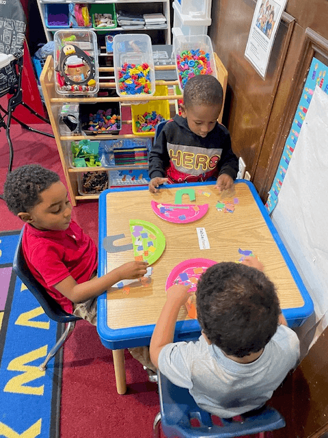 Working together on art projects at the table