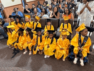 Pre-K graduation day with caps and gowns