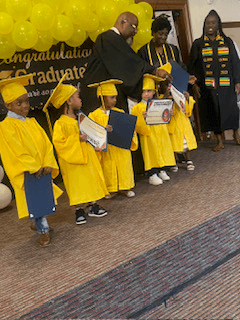 Our little graduates walking the stage