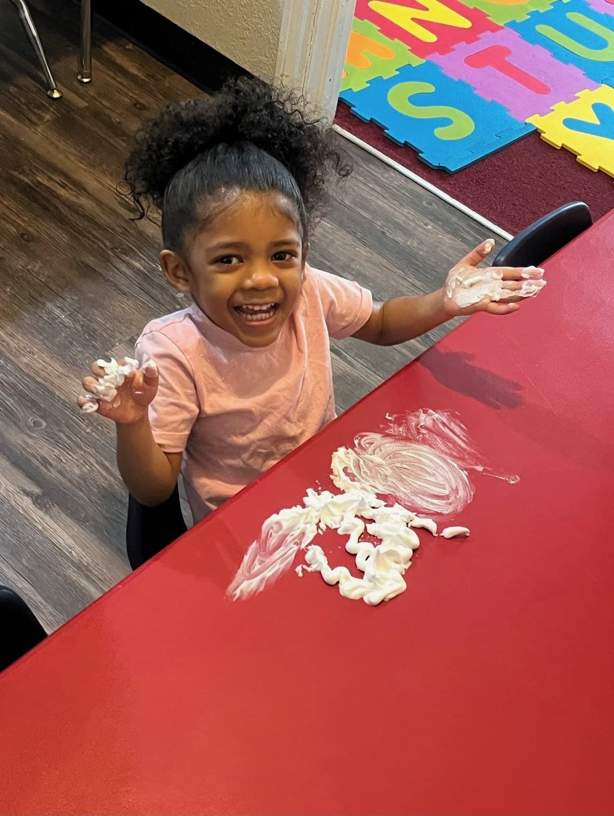 Big laughs during messy sensory play