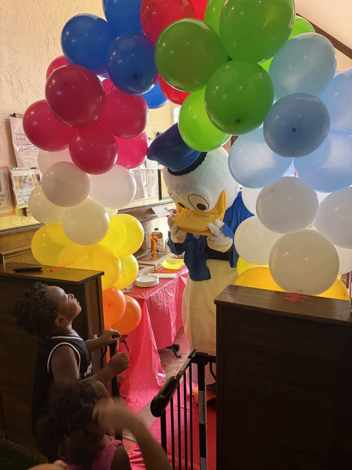 Meeting a special guest under the balloon arch