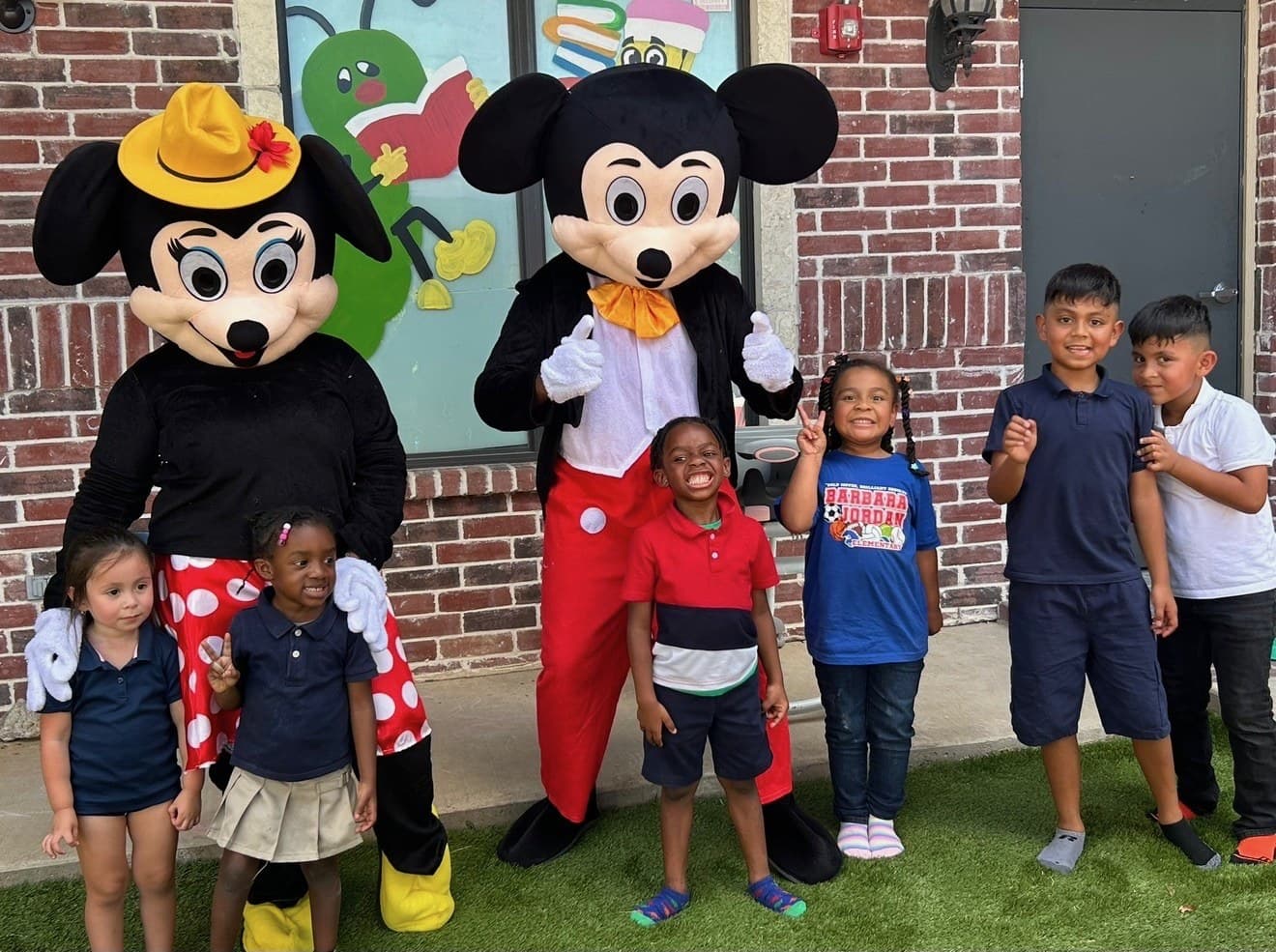 Posing with our costumed guests outside